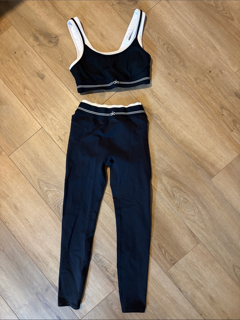 ALO Yoga Black Leggings and Matching Black Sports Bra with White Trim $130